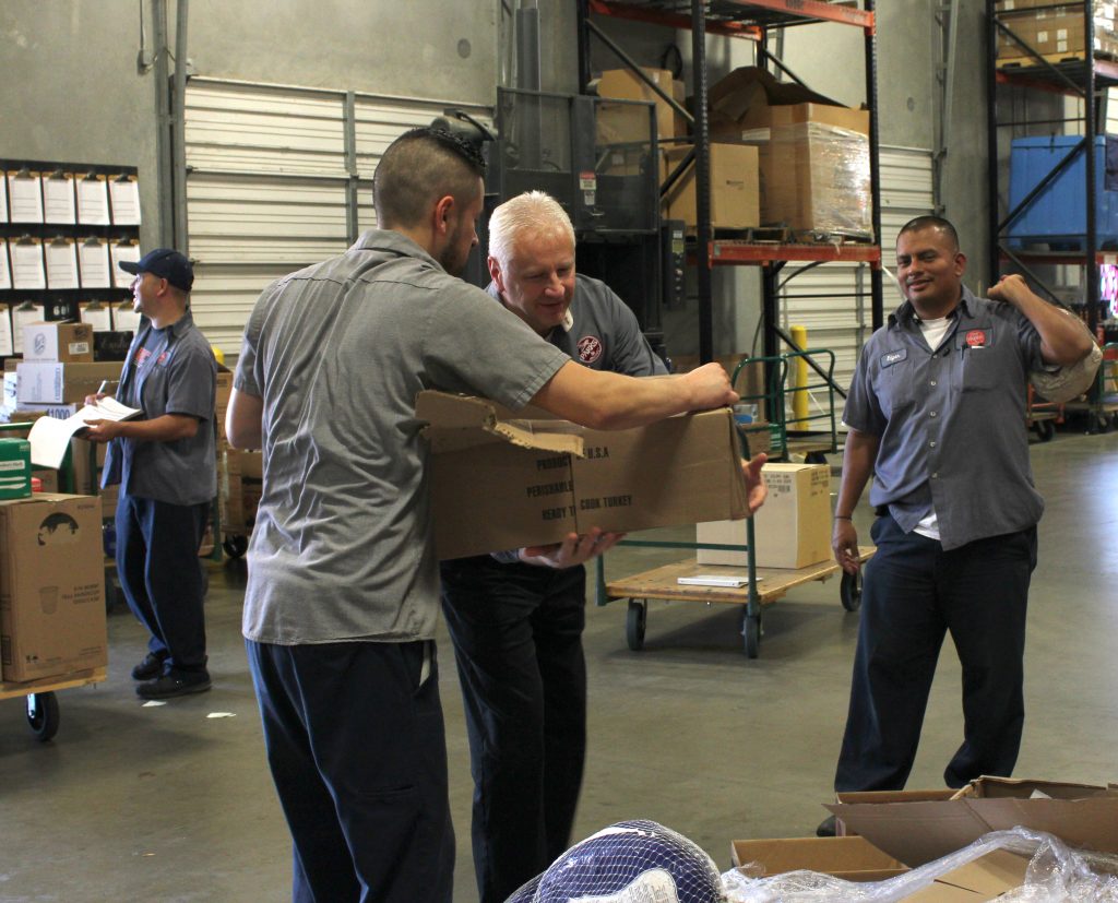 Distributing turkeys and hams to our employees in Dallas, Texas